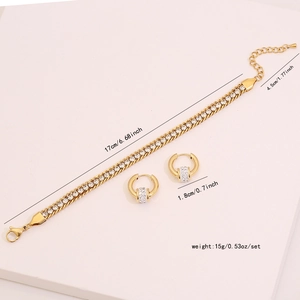 Golden bracelet and hoop earrings jewelry set with sparkling rhinestones and heart charm
