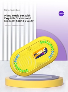 Macro detail of the yellow musical mat control unit with LED lights and power switch