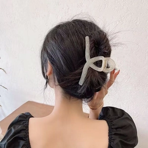 Large translucent grey hair claw clip for women featuring elegant shimmer texture