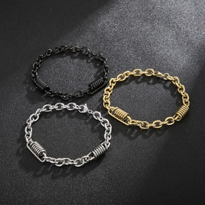 Three industrial style stainless steel link chains in black, gold, and silver finishes