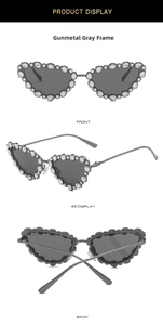 Three-angle view of gunmetal cat-eye sunglasses featuring luxury rhinestone-encrusted frames