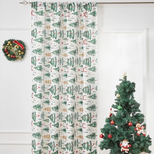 Christmas tree and star print blackout curtains with rod pocket design in festive room