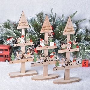 Three creative wooden Christmas tree tabletop ornaments with Merry Christmas engraving