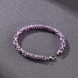 Detailed view of 5mm purple and silver stainless steel Byzantine chain links with lobster clasp