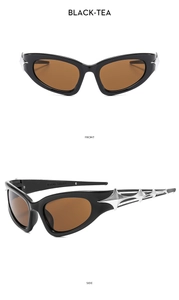Detail of cat-eye sunglasses featuring black frames with silver Y2K star metal accents