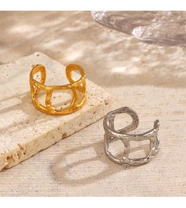 Close-up of geometric hammered texture on 18K gold and silver plated rings