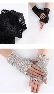 Détail de gants en dentelle sans doigts noirs et gris avec motifs floraux
