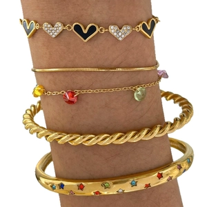 Five-piece gold stainless steel jewelry set with colorful crystals and star heart charms