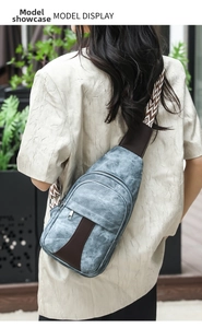 Detail of vintage canvas crossbody chest bag with ethnic pattern strap and leather accents