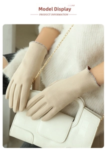 Detailed view of beige velvet gloves featuring elegant wavy edges and bead accents for women