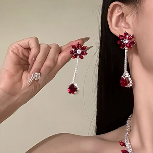Elegant red floral drop earrings with sparkling cubic zirconia on silver-tone base