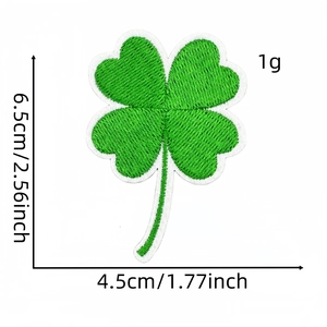 Detailed view of green shamrock embroidery patch with precise size dimensions shown