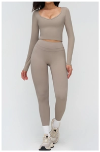 Detail view of milk tea brown yoga set with long sleeve U-neck top and high waist leggings