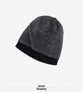 Detail view of the thick warm grey fleece lining inside the winter knitted beanie hat