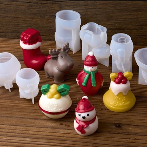Christmas silicone mold set for candles featuring elk, snowman, and bell shapes