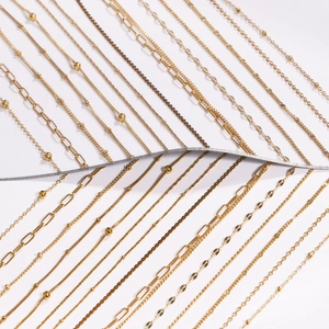 Selection of golden stainless steel chains including snake, cable, and paperclip styles