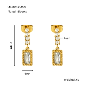 Detailed view of 18k gold plated stainless steel earrings with pearls and zircon stones