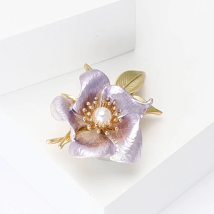 Elegant purple enamel daffodil flower brooch with white pearl and gold metal finish
