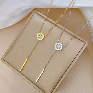 Minimalist Roman numeral Y-necklace with crystal pendant in gold and silver finish