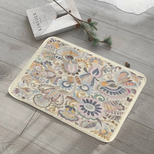 Detail of rectangular flannel mat with vintage floral pattern and non-slip bottom