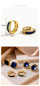 Detail of vintage blue sapphire huggie hoops in gold plating with dimensions 1.33x1.43cm