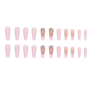Long ballet press-on nails in light pink French style with sparkling diamond accents