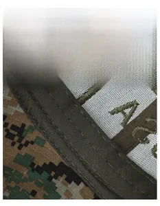 Detail of digital camouflage baseball cap featuring a wide breathable mesh sweatband