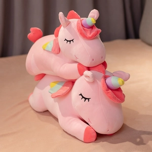 Lying pink rainbow unicorn plush toy with soft wings for girl's comforting gift