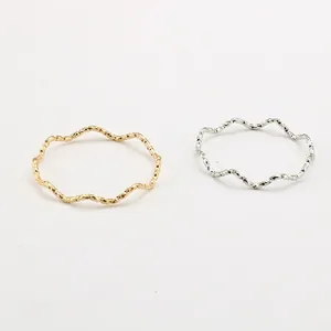 Minimalist wave texture titanium steel rings in gold and silver finish for women