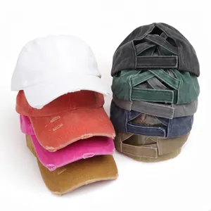 Distressed washed cotton baseball cap with criss-cross ponytail opening in multiple colors