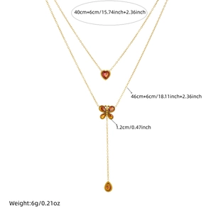 Double-layered gold stainless steel necklace with heart and butterfly crystal pendants