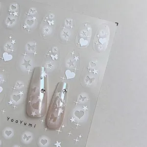 Self-adhesive nail stickers featuring 2D hearts, stars and butterflies on matte finish