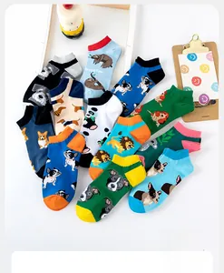 Flat lay of colorful cotton low-cut socks with cartoon animals like Corgi and Panda