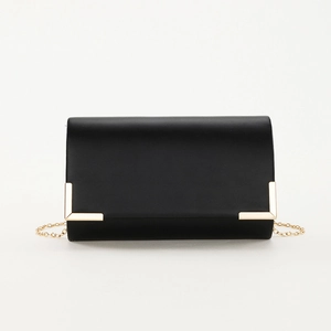 Elegant black PU clutch bag with gold corner protectors and a fine chain strap
