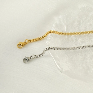 Collier pendentif dragon en titane or et argent avec chaîne tressée et fermoir
