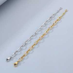 Detail of silver and gold stainless steel rectangle link chains with lobster clasps