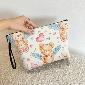 Portable teddy bear heart print makeup bag with zipper and wristlet strap