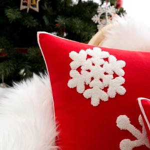 Red Christmas pillow cover with white snowflake embroidery and festive holiday decor