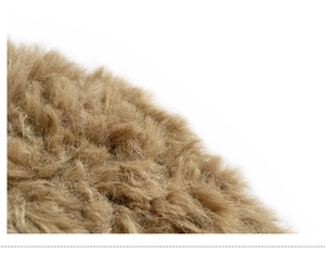 Close-up of the soft plush material and texture of the khaki knitted winter hat