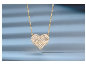 Close-up of heart pendant necklace in gold finish with sparkling pavé micro diamonds
