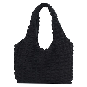 Minimalist black popcorn texture tote bag with a pleated bubble design for daily leisure