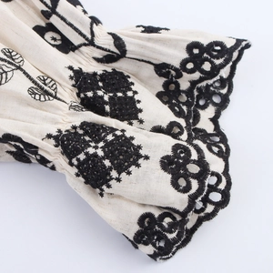 Ethnic bohemian maxi dress with V-neck embroidery and elastic ruffled cuffs detail