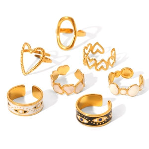 Set of 7 gold stainless steel open rings with heart and evil eye enamel charms