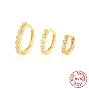 Three pairs of gold S925 sterling silver hoop earrings with cubic zirconia stones