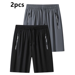 2-pack of men's quick-dry sports shorts in black and gray with zipper pockets