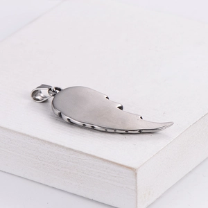 Exquisite silver angel wing pendant made of stainless steel with detailed feather texture