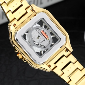 Macro detail of quartz movement SII PC21S inside the gold iced-out square watch case