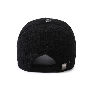 Rear view of black fuzzy baseball cap with adjustable metal buckle and warm lamb wool texture