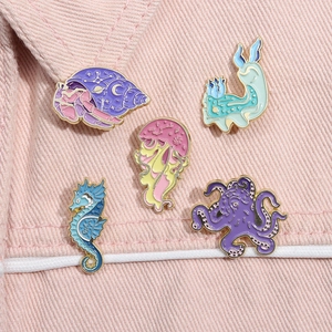 Detailed set of 5 pastel sea animal enamel pins featuring octopus and seahorse designs