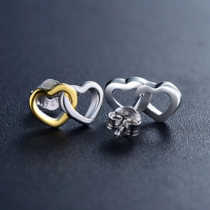 Minimalist S925 sterling silver heart earrings with two-tone gold and silver finish